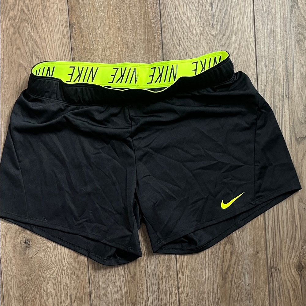 Nike Women's Black Shorts with Yellow Trim